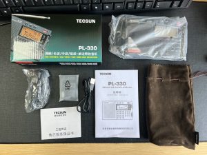 What is in the box of Tecsun PL-330 radio